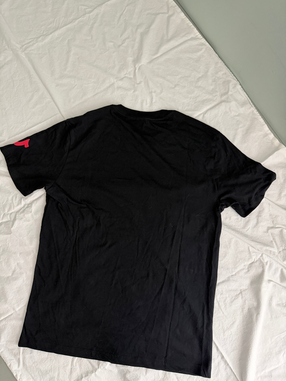 Plain black back view of the True Religion Men's Horseshoe Buddha Graphic Tee, size Large.