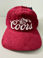 Brand new Coors Banquet Beer corduroy baseball hat featuring a deep maroon structured corduroy crown and brim, white embroidered classic script logo on the front panel, and an adjustable snapback closure from Bell's Bargain Barn. 