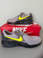 Primary Side View: Side profile of Nike Air Max Excee grey sneaker with neon yellow swoosh.