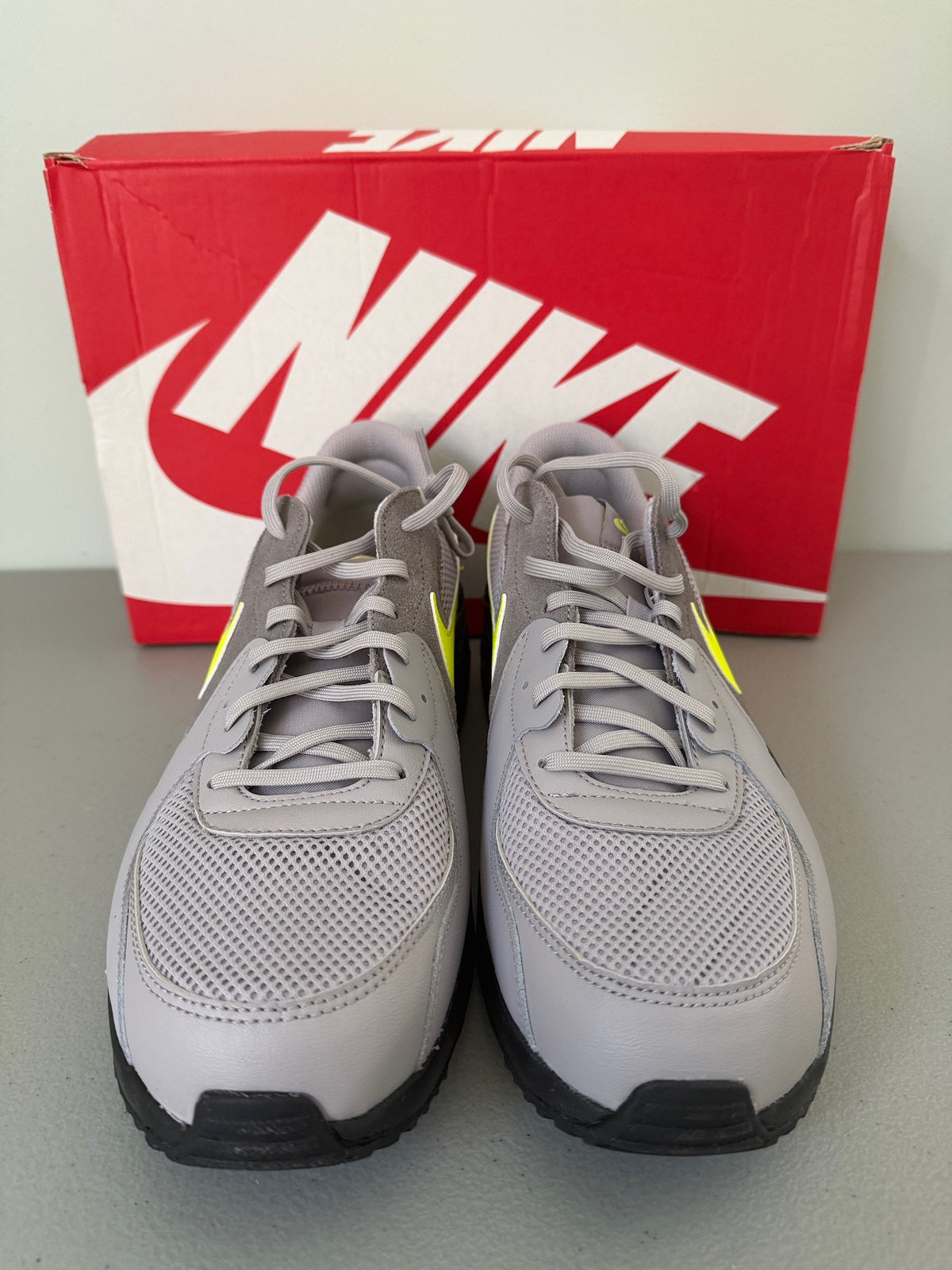 Front View: Front angle view of grey mesh toe box and laces on Nike Air Max Excee.