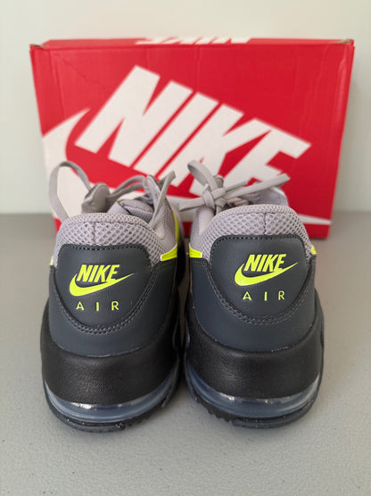 Heel View: Rear view showing the black midsole and visible Air unit on Nike Air Max Excee.