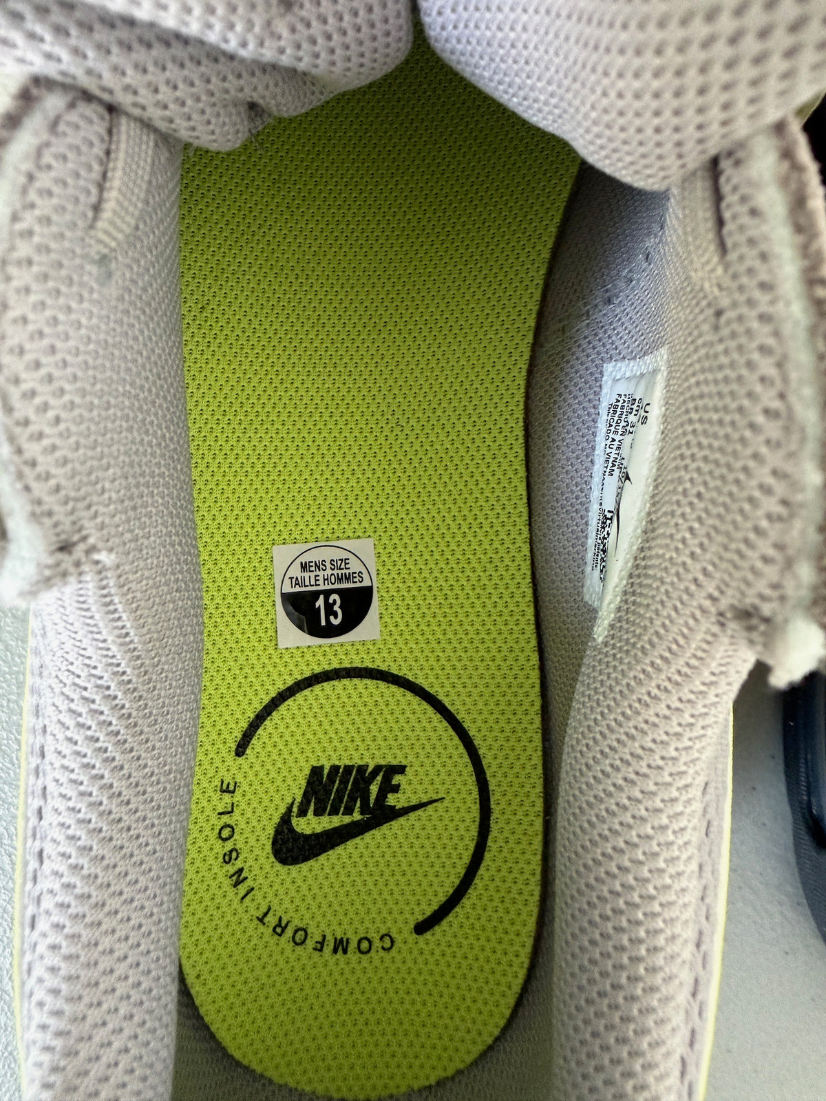 Inner Side View: inner side view of Nike Air Max Excee men's grey and black shoe.  