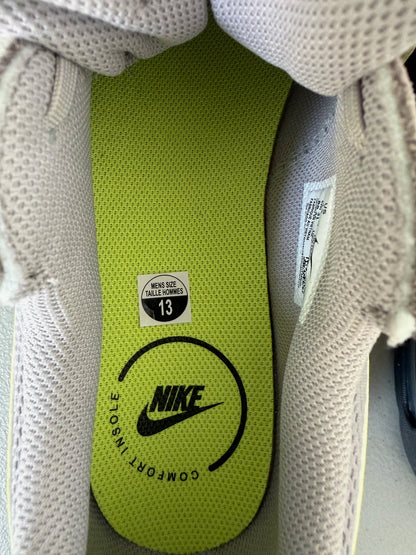 Inner Side View: inner side view of Nike Air Max Excee men's grey and black shoe.  