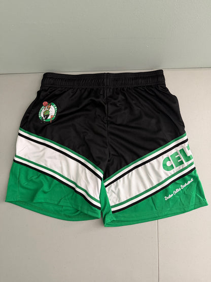 New with tags Men's Boston celtics NBA basketball shorts in black and green mesh, showing the front design and Lucky the Leprechaun logo. 