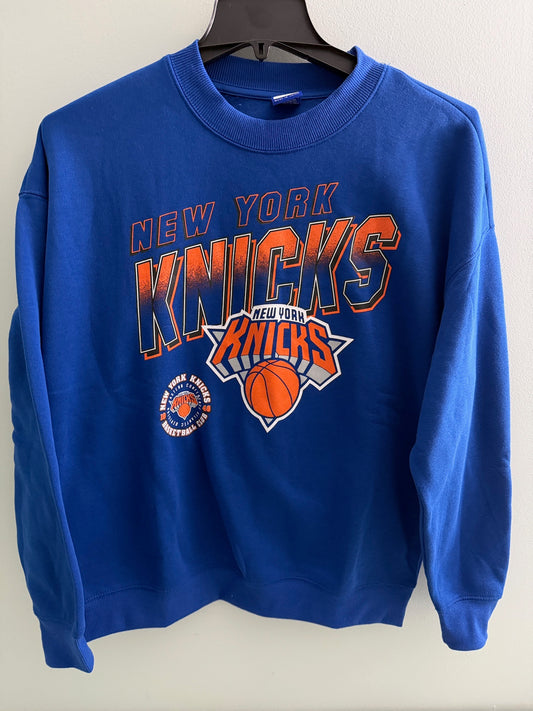 New with tags Men's New York Knicks NBA crewneck sweatshirt in royal blue featuring large orange and white graphic team logos.