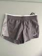Front view of brand new Nike Women's 10K running shorts in grey with white mesh side panels and white Swoosh logo.