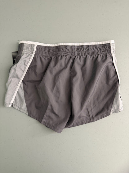 Back view of Nike Women's 10K athletic shorts in grey, showing the elastic waistband and lightweight fabric structure