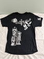 Front view of Popular Poison "The World Is Yours"  men's black graphic t-shirt featuring a detailed white and gray screen print of stone angel statues, flying doves, a central cross, and gothic script text.
