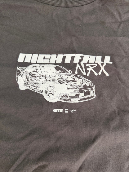 Close-up of white JDM-style sports car graphic print and Nightfall NRX logo text on a gray CVLA t-shirt.