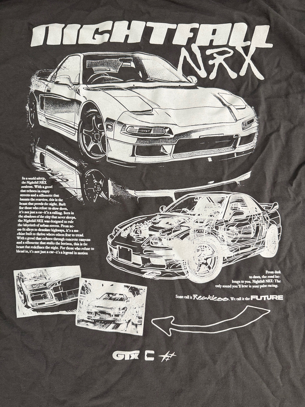 Close-up view of the large white JDM car graphic print detailed artwork on the back of a gray CVLA Nightfall NRX shirt. 
