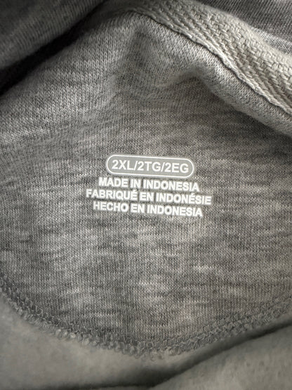 Size tag layout showing Men's 2XL/2TG/2REG on a gray NFL Champions hoodie. 