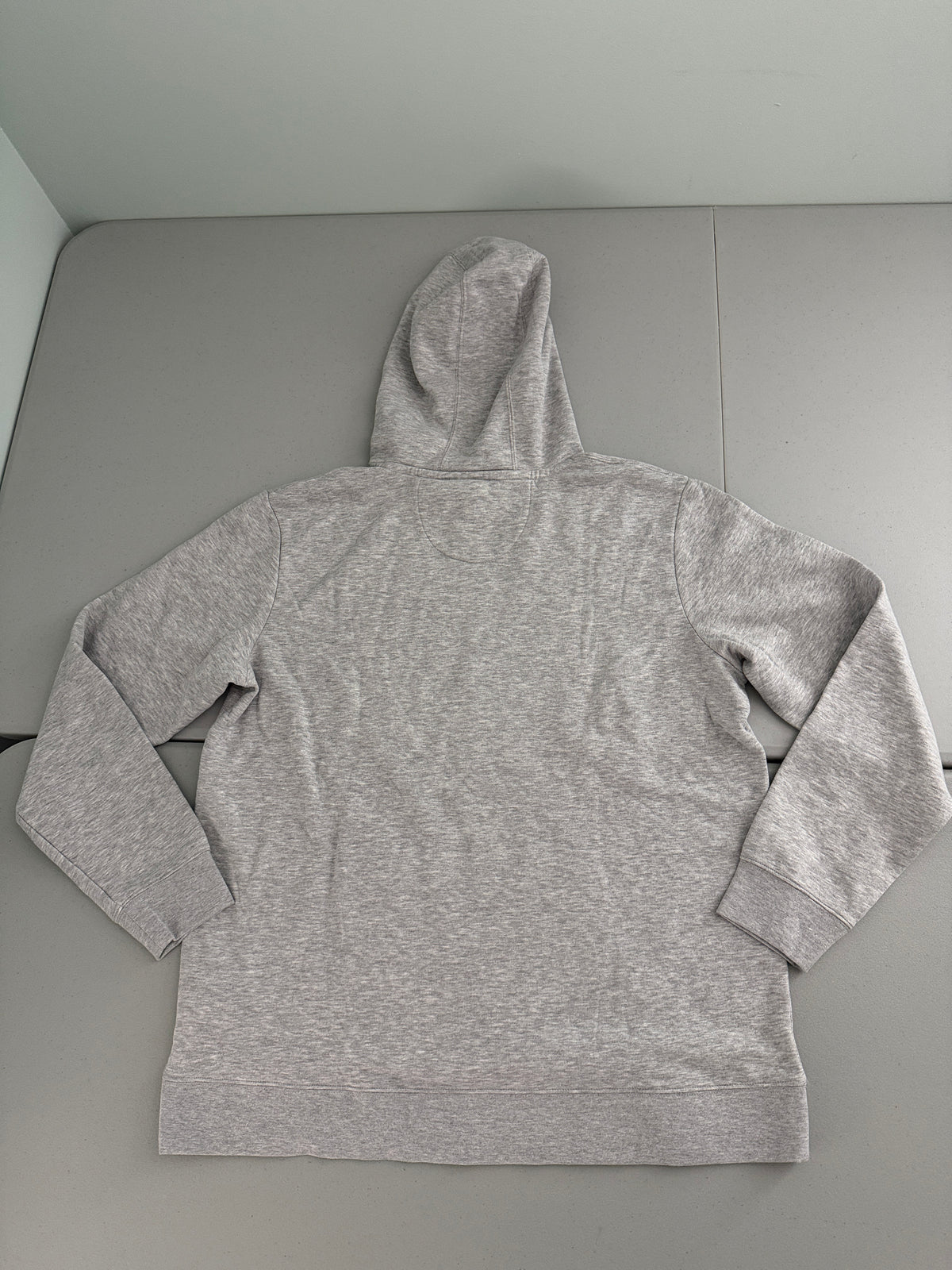 Back view ofa  Brand new gray Men's Kansas City Chiefs Super Bowl LVIII Champions pullover hoodie sweatshirt with front kangaroo pockets