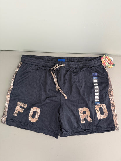 Flat lay front view of officially licensed Ford  by RoadTrip men's size XXL athletic mesh shorts navy blue with brown camouflage side panels and integrated camo Ford lettering. 